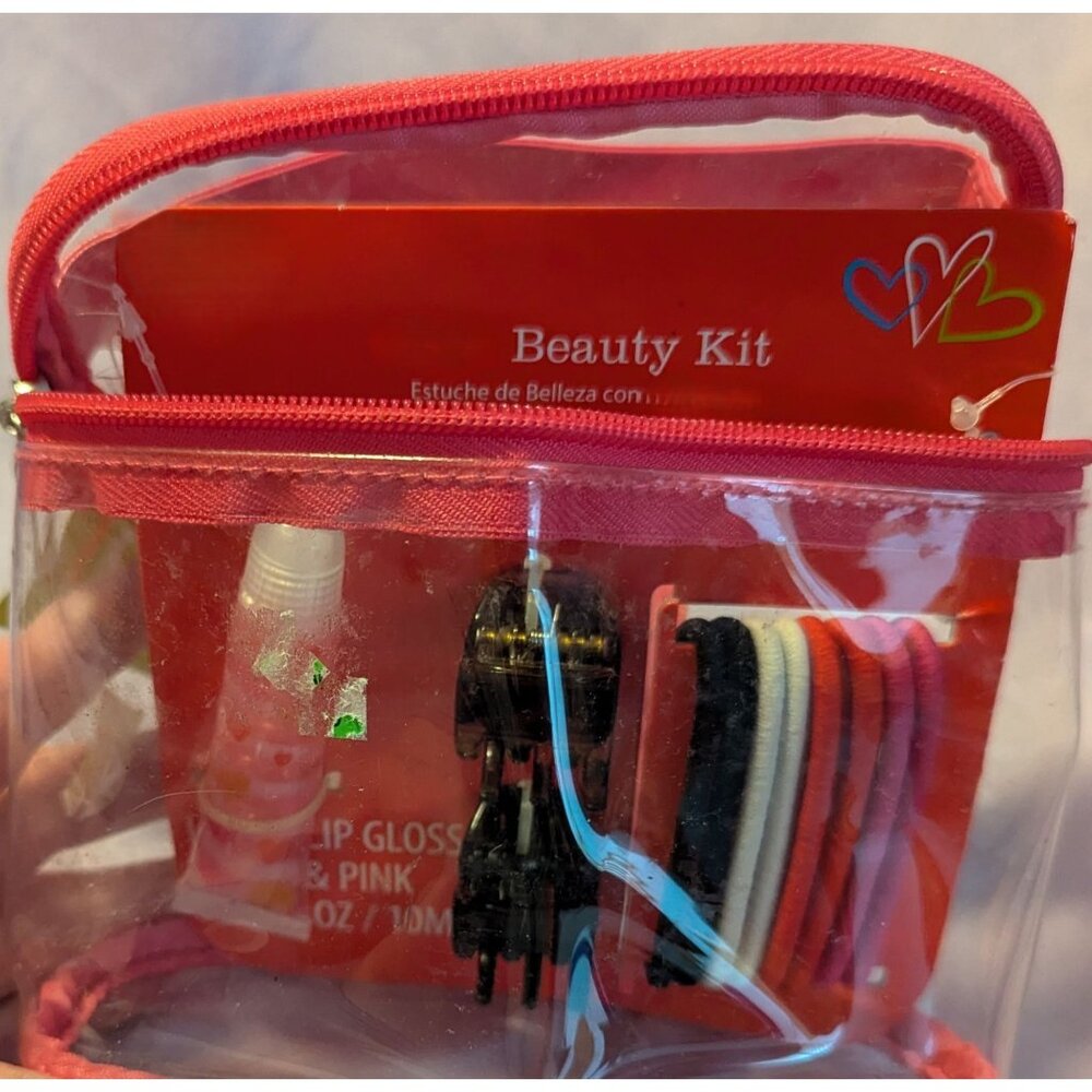 Girls Beauty Kit With Lip Gloss & Hair Accessories In Clear Pink Pouch
